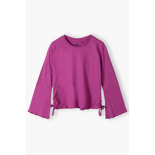 Różowa bluzka dziewczęca z rozszerzanymi rękawami ze sklepu 5.10.15 w kategorii Bluzki dziewczęce - zdjęcie 169702808