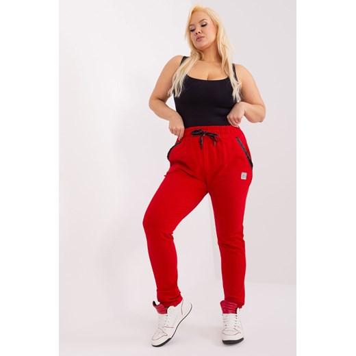Dresowe spodnie plus size z wiązaniem czerwony ze sklepu 5.10.15 w kategorii Spodnie damskie - zdjęcie 169706385