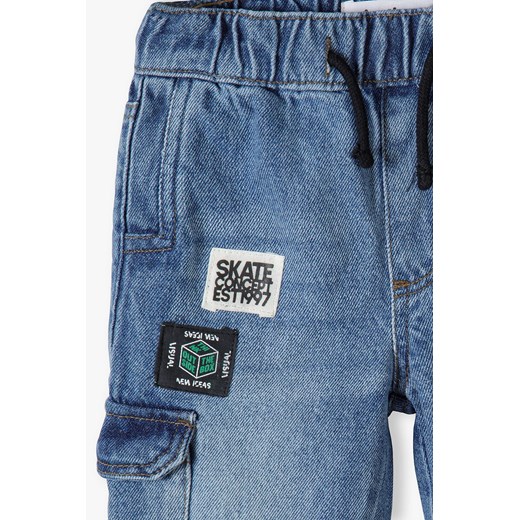 Spodnie jeansowe dla niemowlaka z naszywkami Minoti 86/92 5.10.15