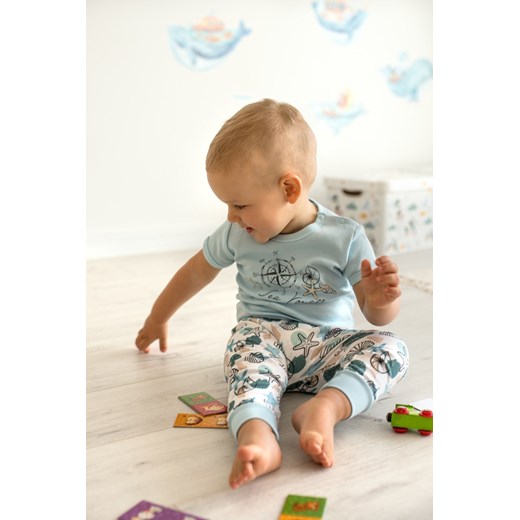 Bawełniane spodnie niemowlęce w muszelki ze sklepu 5.10.15 w kategorii Spodnie i półśpiochy - zdjęcie 169707677
