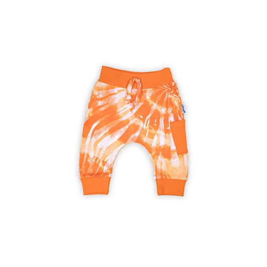 Bawełniane spodnie dresowe niemowlęce we wzory pomarańczowe ze sklepu 5.10.15 w kategorii Spodnie i półśpiochy - zdjęcie 169712419