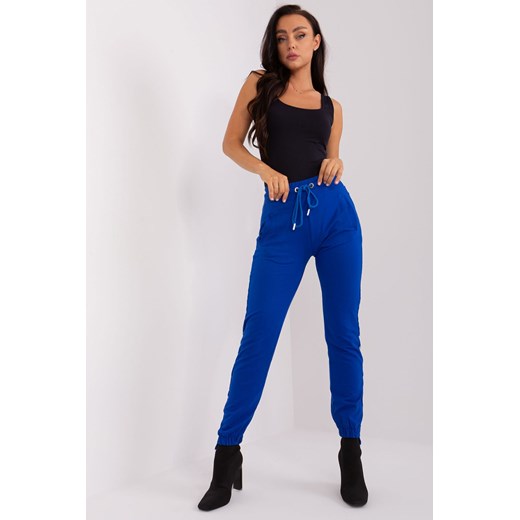 Kobaltowe spodnie dresowe z kieszeniami ze sklepu 5.10.15 w kategorii Spodnie damskie - zdjęcie 169712677