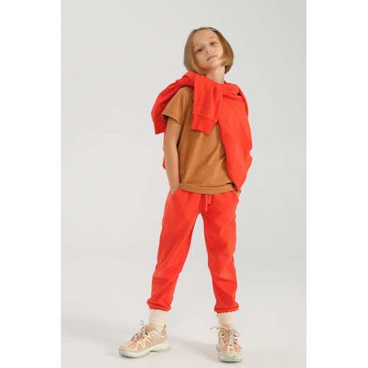 Pomarańczowe spodnie dresowe dla dziecka - unisex - Limited Edition ze sklepu 5.10.15 w kategorii Spodnie chłopięce - zdjęcie 169715758