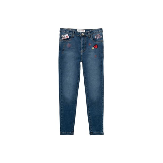Spodnie dziewczęce jeansowe z naszywkami ze sklepu 5.10.15 w kategorii Spodnie dziewczęce - zdjęcie 169716616