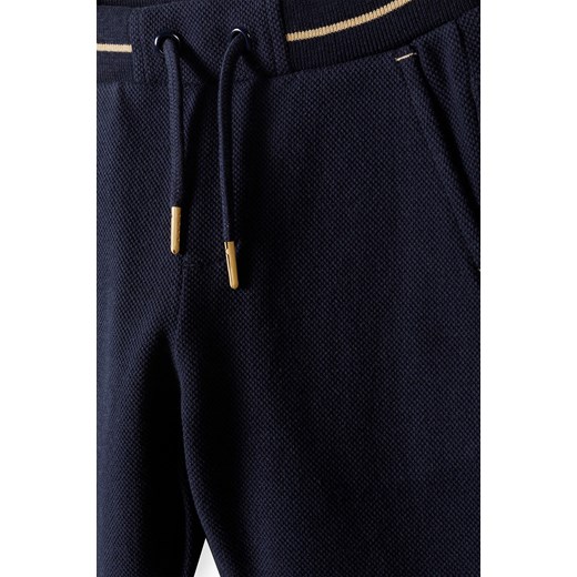 Granatowe eleganckie spodnie dresowe regular chłopięce 5.10.15. 128 5.10.15