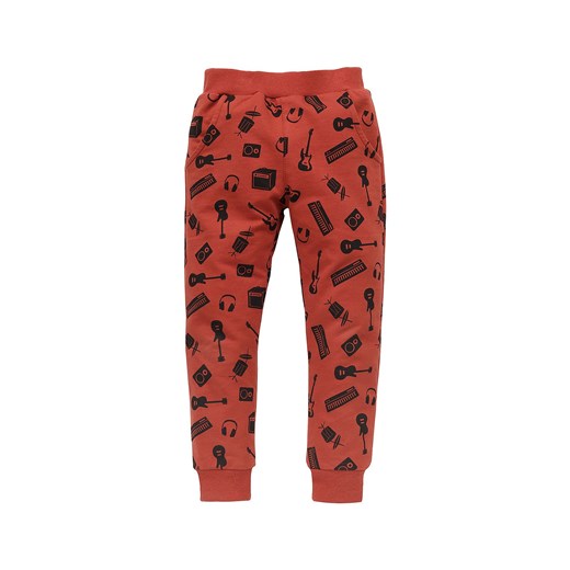 Luźne spodnie niemowlęce z bawełny Let's rock czerwone ze sklepu 5.10.15 w kategorii Spodnie chłopięce - zdjęcie 169725337