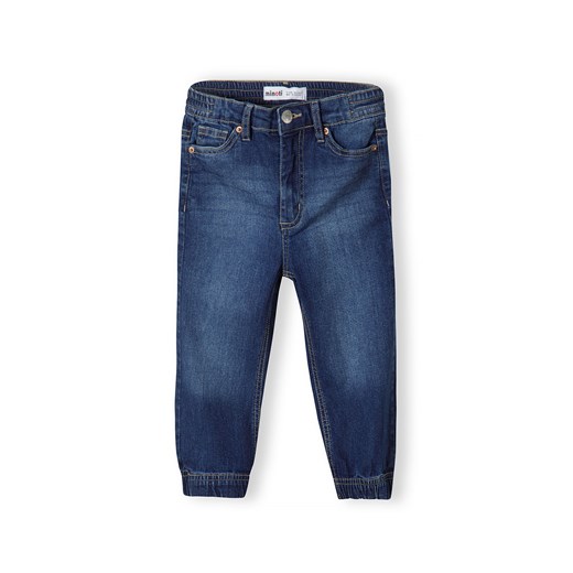 Niemowlęce jeansy o kroju joggerów z mankietami u dołu ze sklepu 5.10.15 w kategorii Spodnie i półśpiochy - zdjęcie 169729137