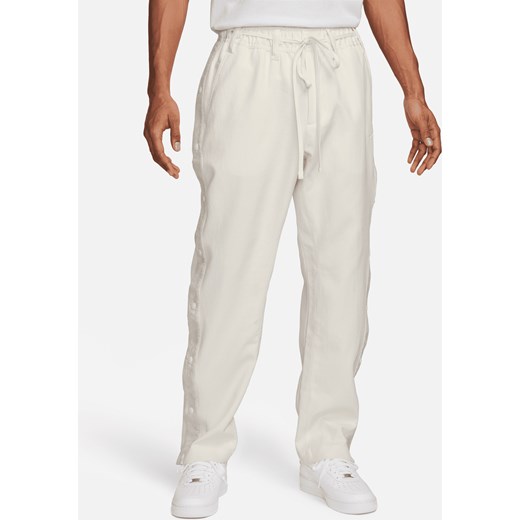 Męskie rozpinane spodnie do koszykówki Nike - Biel ze sklepu Nike poland w kategorii Spodnie męskie - zdjęcie 169754408