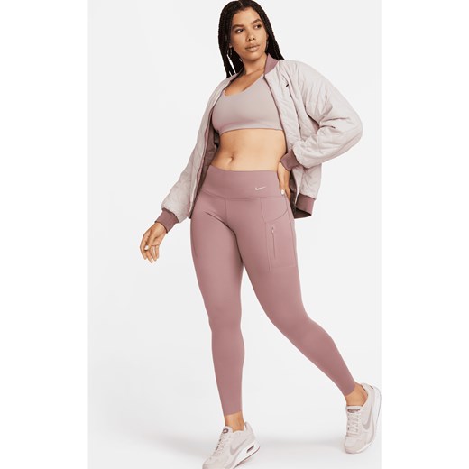 Damskie legginsy o pełnej długości ze średnim stanem i kieszeniami zapewniające mocne wsparcie Nike Go - Fiolet ze sklepu Nike poland w kategorii Spodnie damskie - zdjęcie 169754639