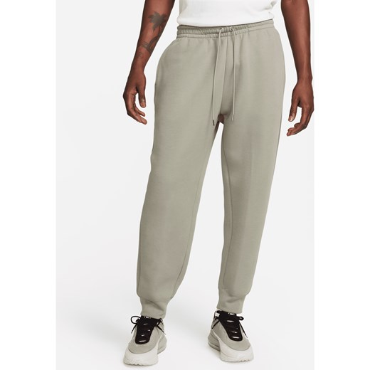 Męskie spodnie z dzianiny Nike Tech Fleece Reimagined - Szary ze sklepu Nike poland w kategorii Spodnie męskie - zdjęcie 169755076