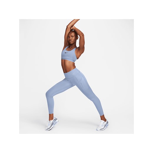 Damskie legginsy ze średnim stanem i kieszeniami o długości 7/8 zapewniające mocne wsparcie Nike Go - Niebieski ze sklepu Nike poland w kategorii Spodnie damskie - zdjęcie 169755429