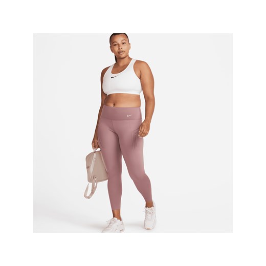 Damskie legginsy ze średnim stanem i kieszeniami o długości 7/8 zapewniające mocne wsparcie Nike Go - Fiolet ze sklepu Nike poland w kategorii Spodnie damskie - zdjęcie 169756056