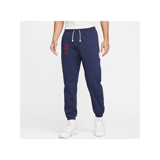 Męskie spodnie piłkarskie Nike Paris Saint-Germain Standard Issue - Niebieski ze sklepu Nike poland w kategorii Spodnie męskie - zdjęcie 169756715