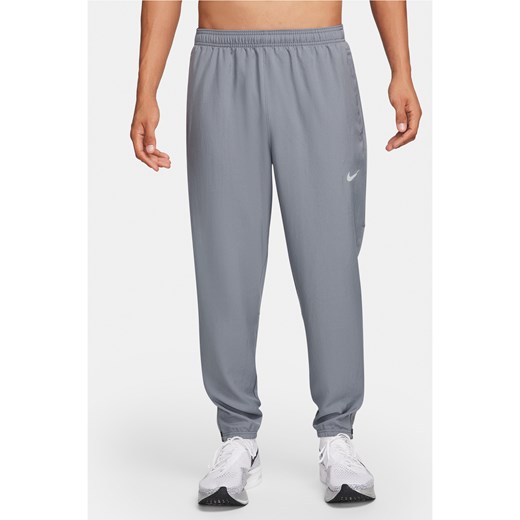 Męskie spodnie do biegania z tkaniny Dri-FIT Nike Challenger - Szary ze sklepu Nike poland w kategorii Spodnie męskie - zdjęcie 169756725