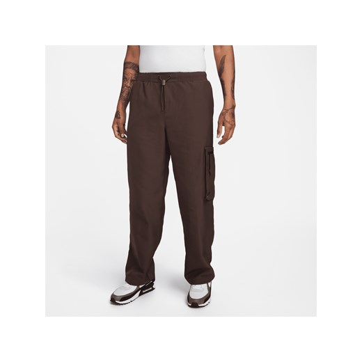 Męskie spodnie utility z tkaniny Nike Sportswear Tech Pack - Brązowy ze sklepu Nike poland w kategorii Spodnie męskie - zdjęcie 169756869