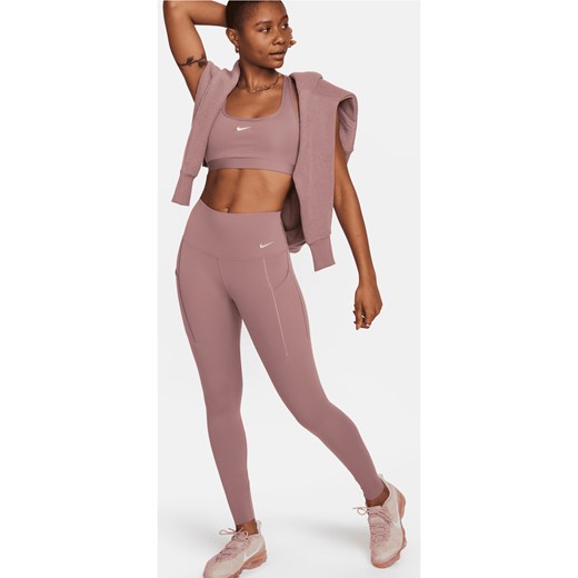 Damskie legginsy o pełnej długości z wysokim stanem i kieszeniami zapewniające średnie wsparcie Nike Universa - Fiolet ze sklepu Nike poland w kategorii Spodnie damskie - zdjęcie 169757886