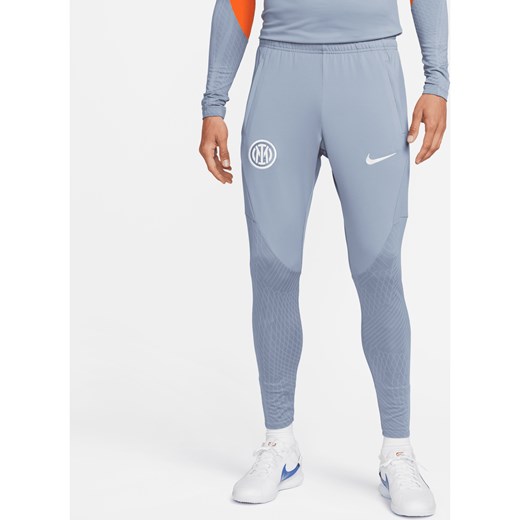 Męskie spodnie piłkarskie z dzianiny Nike Dri-FIT Inter Mediolan Strike (wersja trzecia) - Niebieski ze sklepu Nike poland w kategorii Spodnie męskie - zdjęcie 169757929
