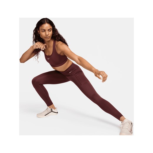 Damskie legginsy o pełnej długości ze średnim stanem i kieszeniami zapewniające mocne wsparcie Nike Go - Czerwony ze sklepu Nike poland w kategorii Spodnie damskie - zdjęcie 169758448