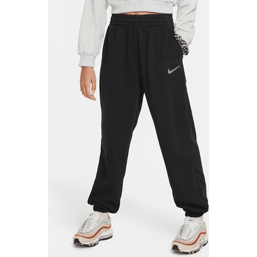 Luźne joggery z dzianiny dla dużych dzieci (dziewcząt) Dri-FIT Nike Sportswear - Czerń ze sklepu Nike poland w kategorii Spodnie dziewczęce - zdjęcie 169758915