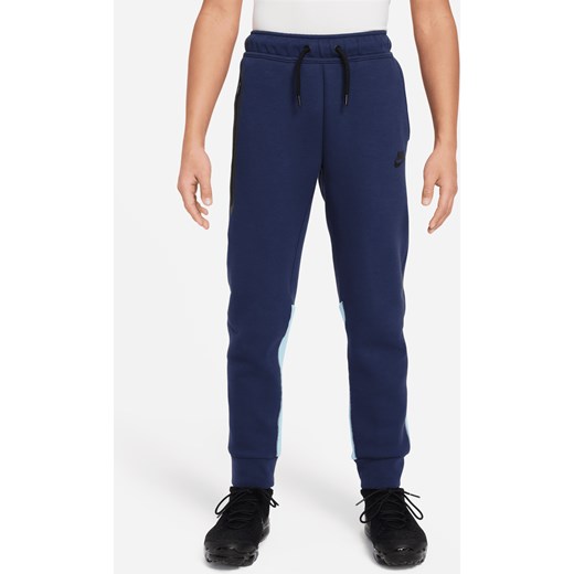 Spodnie dla dużych dzieci (chłopców) Nike Sportswear Tech Fleece - Niebieski ze sklepu Nike poland w kategorii Spodnie chłopięce - zdjęcie 169759215