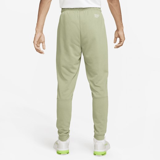 Męskie zwężane spodnie do fitnessu Nike Dri-FIT - Zieleń Nike L Nike poland