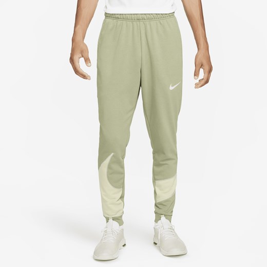 Męskie zwężane spodnie do fitnessu Nike Dri-FIT - Zieleń Nike L Nike poland