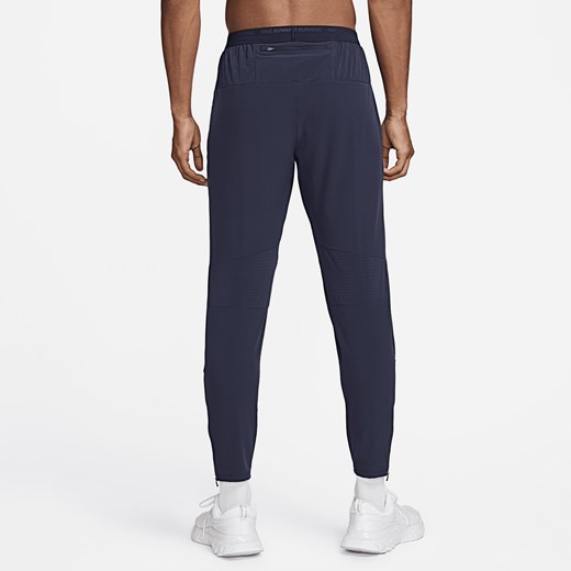 Męskie spodnie do biegania z tkaniny Nike Dri-FIT Phenom - Niebieski Nike L Nike poland