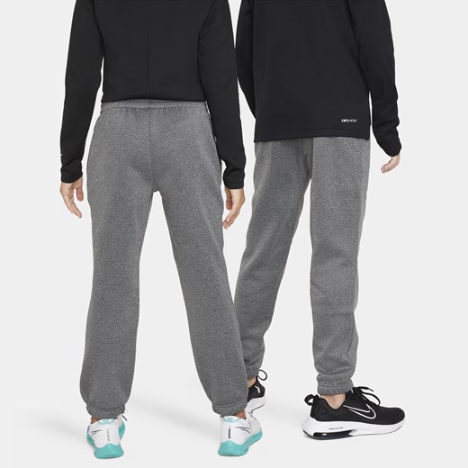 Spodnie zimowe dla dużych dzieci Nike Therma-FIT - Czerń Nike XL Nike poland