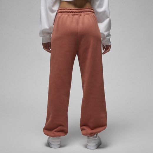 Spodnie damskie Jordan Flight Fleece - Pomarańczowy Jordan XXL (EU 52-54) promocyjna cena Nike poland