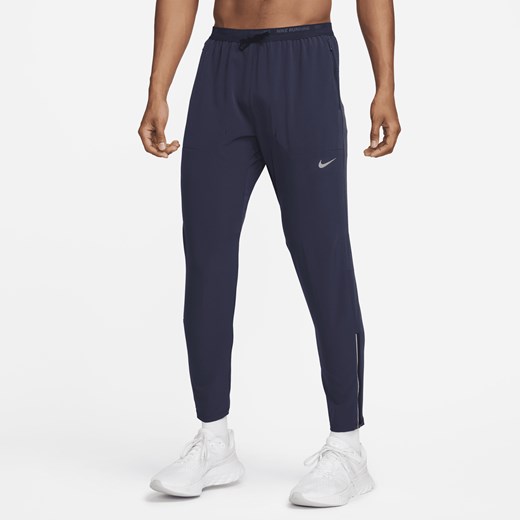 Męskie spodnie do biegania z tkaniny Nike Dri-FIT Phenom - Niebieski Nike XL Nike poland