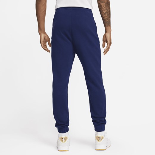 Niebieskie spodnie męskie Nike dresowe 