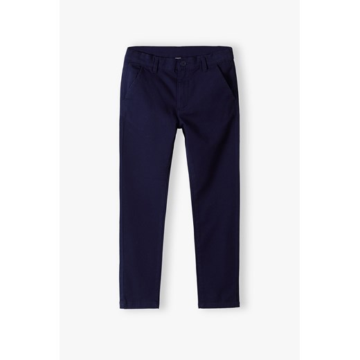 Granatowe eleganckie spodnie chinosy dla chłopca ze sklepu 5.10.15 w kategorii Spodnie chłopięce - zdjęcie 169782698
