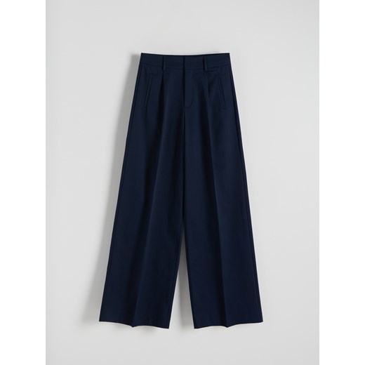 Reserved - Spodnie z szerokimi nogawkami - granatowy ze sklepu Reserved w kategorii Spodnie damskie - zdjęcie 169786217