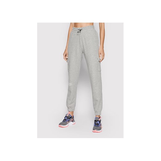 Nike Spodnie dresowe Sportswear Swoosh CZ8905 Szary Standard Fit ze sklepu MODIVO w kategorii Spodnie damskie - zdjęcie 169802198
