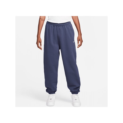 Męskie spodnie z dzianiny Nike Solo Swoosh - Niebieski Nike M Nike poland