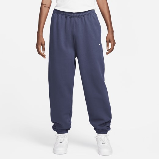 Męskie spodnie z dzianiny Nike Solo Swoosh - Niebieski Nike M Nike poland