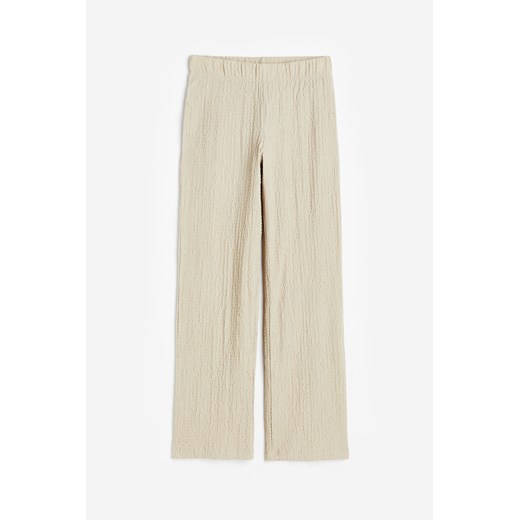 H & M - Spodnie z kreszowanego dżerseju - Beżowy ze sklepu H&M w kategorii Spodnie damskie - zdjęcie 169849235
