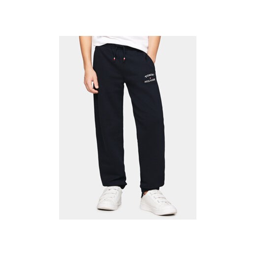 Tommy Hilfiger Spodnie dresowe Th Logo KB0KB08838 Granatowy Regular Fit ze sklepu MODIVO w kategorii Spodnie chłopięce - zdjęcie 169973886