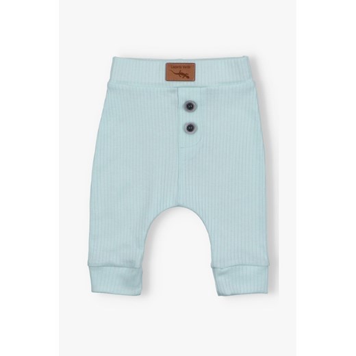Różowe spodnie niemowlęce z dzianiny prążkowej -  Lagarto Verde ze sklepu 5.10.15 w kategorii Spodnie i półśpiochy - zdjęcie 169994599