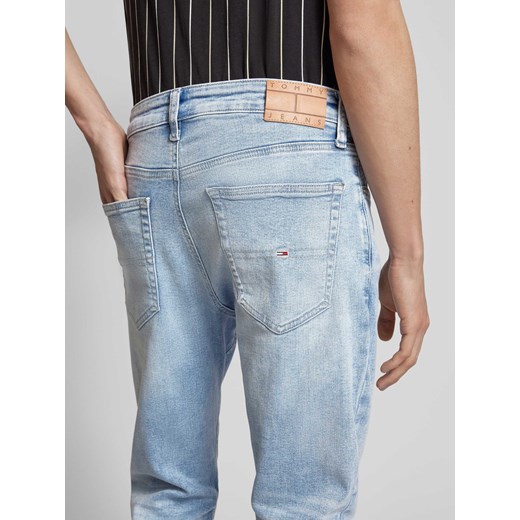 Jeansy o kroju slim tapered fit z 5 kieszeniami model ‘AUSTIN’ Tommy Jeans 33/32 Peek&Cloppenburg 