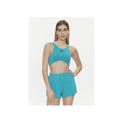 Calvin Klein Swimwear Góra od bikini KW0KW02442 Niebieski ze sklepu MODIVO w kategorii Stroje kąpielowe - zdjęcie 170211295