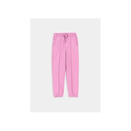 Coccodrillo Spodnie dresowe WC4120103CEK Różowy Regular Fit ze sklepu MODIVO w kategorii Spodnie dziewczęce - zdjęcie 170236915