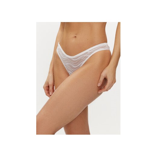 Calvin Klein Underwear Stringi 000QD3971E Biały ze sklepu MODIVO w kategorii Majtki damskie - zdjęcie 170322549