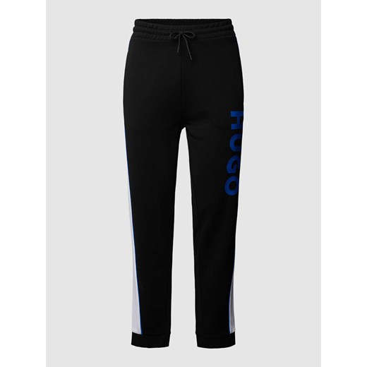 NOWOŚĆ w P&C: Spodnie dresowe o kroju regular fit model ‘Narlos’ Hugo Blue M Peek&Cloppenburg 