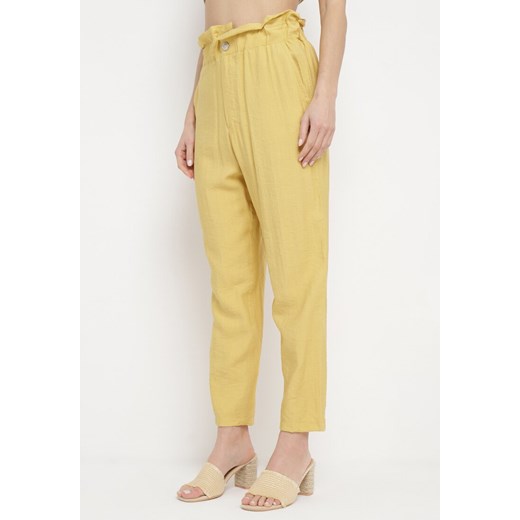 Żółte Spodnie z Marszczoną Gumką w Pasie o Klasycznym Kroju Anifa ze sklepu Born2be Odzież w kategorii Spodnie damskie - zdjęcie 170390216