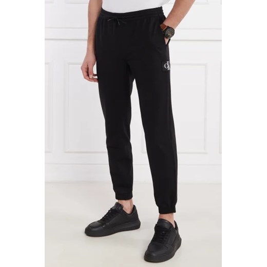 CALVIN KLEIN JEANS Spodnie dresowe | Slim Fit L promocyjna cena Gomez Fashion Store