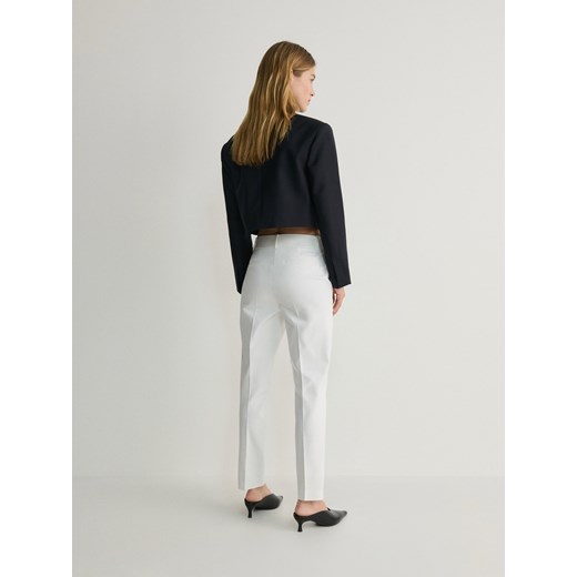 Spodnie damskie białe Reserved 