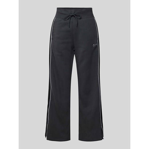Spodnie dresowe o rozkloszowanym kroju z elastycznym pasem ze sklepu Peek&Cloppenburg  w kategorii Spodnie damskie - zdjęcie 170551227