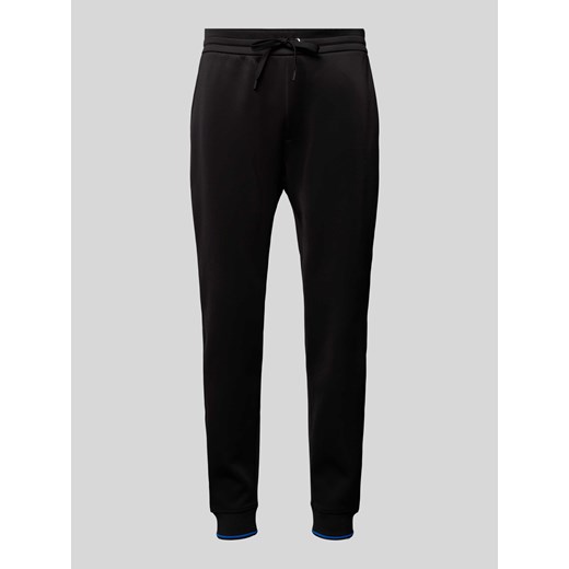 Spodnie dresowe o kroju regular fit z paskami w kontrastowym kolorze ze sklepu Peek&Cloppenburg  w kategorii Spodnie męskie - zdjęcie 170552168