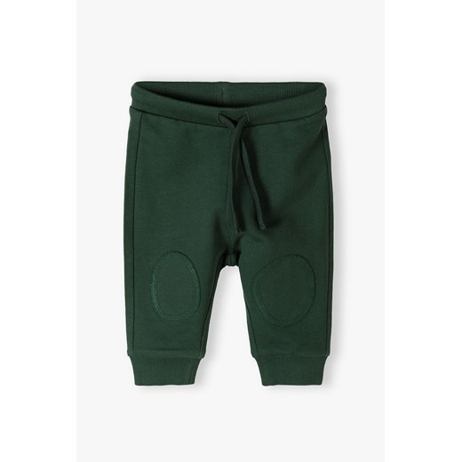 Zielone bawełniane spodnie dresowe niemowlęce - 5.10.15. ze sklepu 5.10.15 w kategorii Spodnie i półśpiochy - zdjęcie 170556157